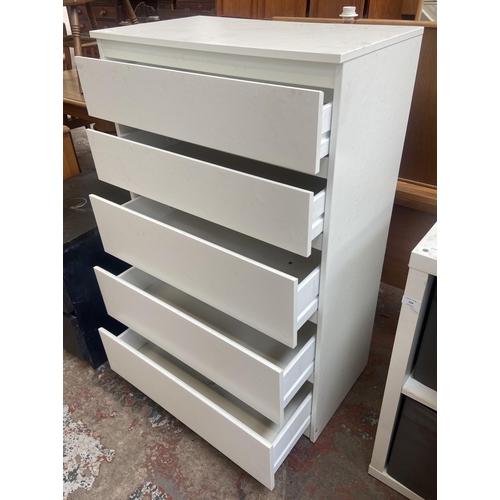 102 - An IKEA white laminate chest of drawers - approx. 113cm high x 70cm wide x 40cm deep