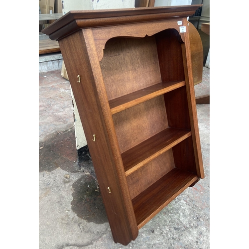 103 - A mahogany wall mountable three tier shelving unit - approx. 90cm high x 58cm wide x 20cm deep