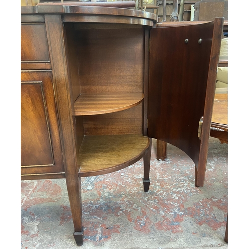 112 - A Bevan Funnell Reprodux mahogany demi lune sideboard on tapering supports - approx. 87cm high x 137... 