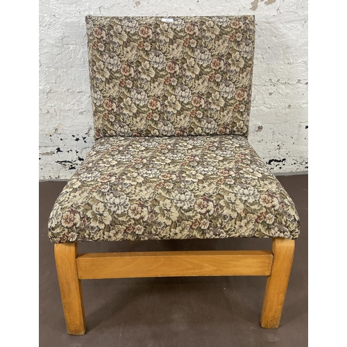 114 - A mid 20th century bentwood and floral fabric upholstered lounge chair