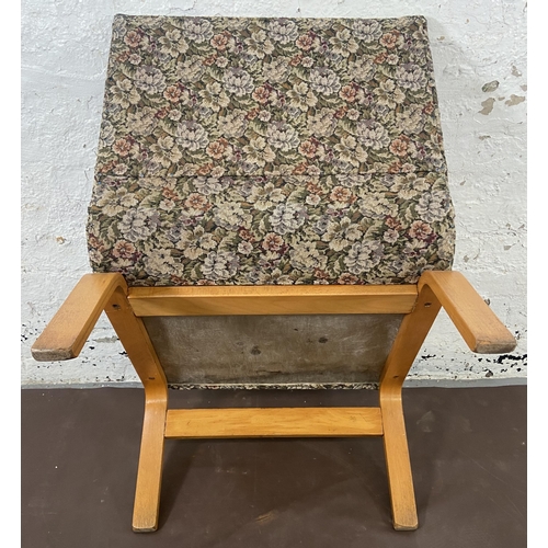 114 - A mid 20th century bentwood and floral fabric upholstered lounge chair