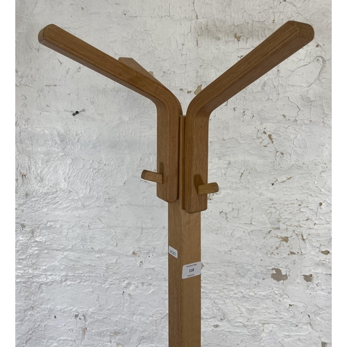 118 - A modern oak and bentwood coat stand - approx. 183cm high