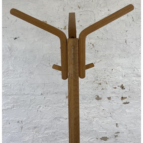 118 - A modern oak and bentwood coat stand - approx. 183cm high