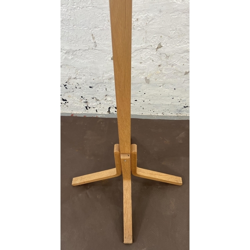 118 - A modern oak and bentwood coat stand - approx. 183cm high