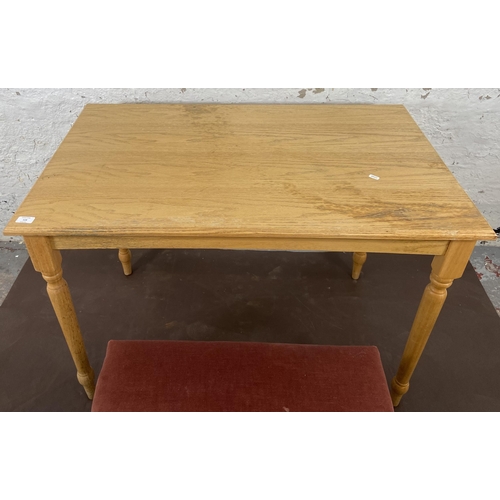 119 - Four pieces of furniture, one oak and beech rectangular dining table and three pieces of Lloyd Loom ... 