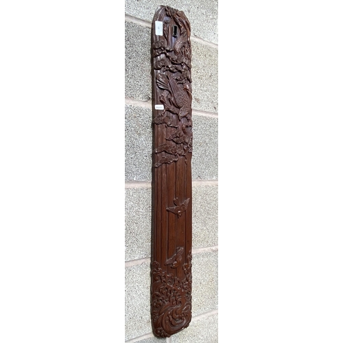 13 - A Chinese carved hardwood wall plaque with bird and foliate design - approx. 98cm high x 14cm wide