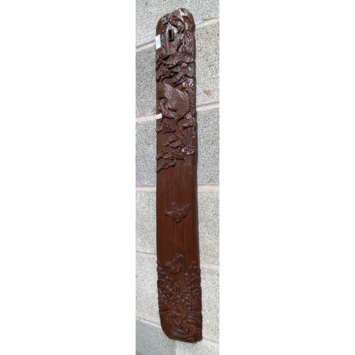 13 - A Chinese carved hardwood wall plaque with bird and foliate design - approx. 98cm high x 14cm wide