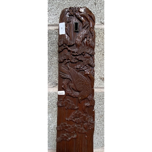 13 - A Chinese carved hardwood wall plaque with bird and foliate design - approx. 98cm high x 14cm wide