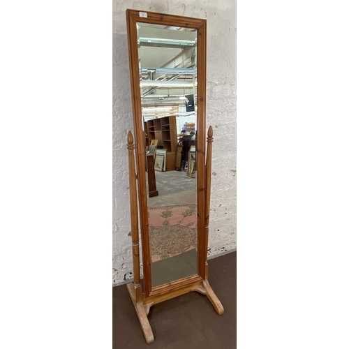 132 - A pine framed bevelled edge cheval mirror - approx. 176cm high x 53cm wide x 50cm deep