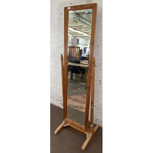 132 - A pine framed bevelled edge cheval mirror - approx. 176cm high x 53cm wide x 50cm deep