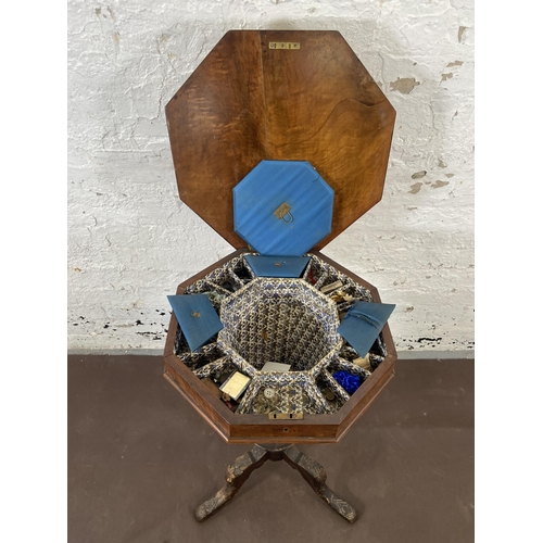 134 - A Victorian inlaid walnut octagonal tripod pedestal sewing table - approx. 76cm high x 44cm wide x 4... 