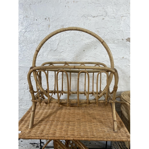 136 - Nine pieces of wicker and bamboo furniture to include two mid 20th century magazine racks, miniature... 