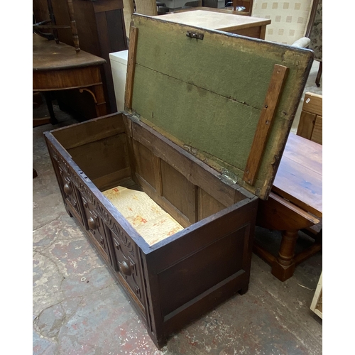 137 - A Georgian carved oak blanket box - approx. 52cm high x 107cm wide x 48cm deep