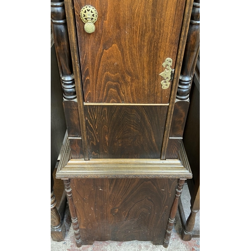 15 - A Georgian style oak cased grandfather clock with barley twist design, brass face and pendulum - app... 