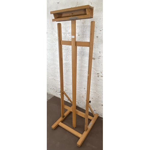 155 - A beech artist's easel - approx. 157cm high x 51cm wide x 61cm deep