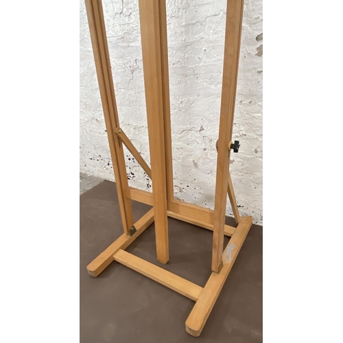 155 - A beech artist's easel - approx. 157cm high x 51cm wide x 61cm deep