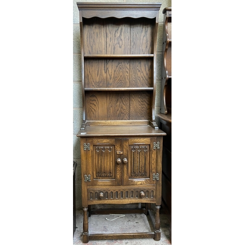 16 - A carved oak linenfold narrow dresser - approx. 170cm high x 60cm wide x 40cm deep