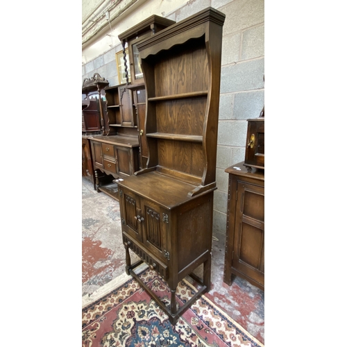 16 - A carved oak linenfold narrow dresser - approx. 170cm high x 60cm wide x 40cm deep