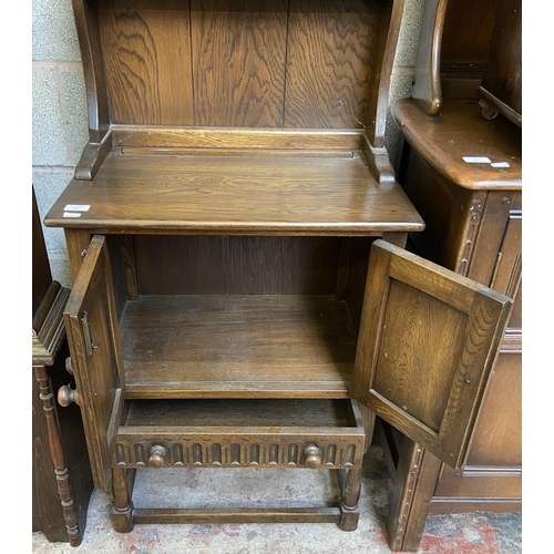 16 - A carved oak linenfold narrow dresser - approx. 170cm high x 60cm wide x 40cm deep