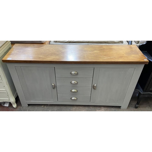 28 - A modern oak and grey painted sideboard - approx. 79cm high x 150cm wide x 38cm deep