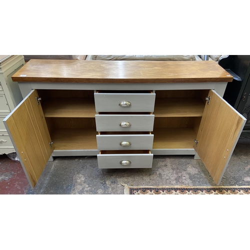 28 - A modern oak and grey painted sideboard - approx. 79cm high x 150cm wide x 38cm deep