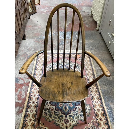 37 - A mid 20th century Ercol Windsor elm and beech Quaker carver chair