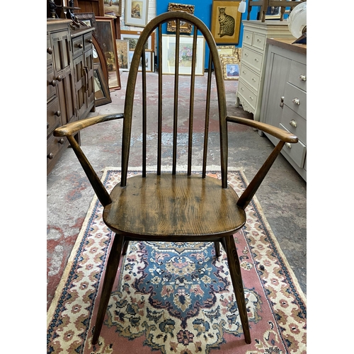 37 - A mid 20th century Ercol Windsor elm and beech Quaker carver chair