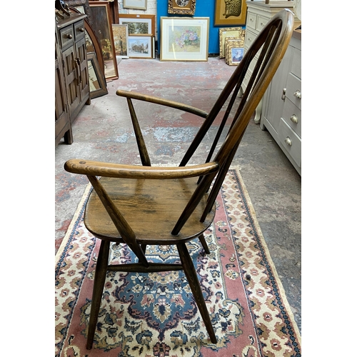 37 - A mid 20th century Ercol Windsor elm and beech Quaker carver chair