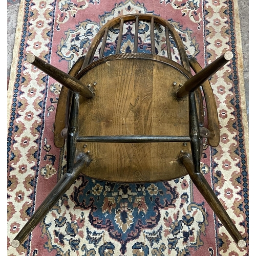 37 - A mid 20th century Ercol Windsor elm and beech Quaker carver chair