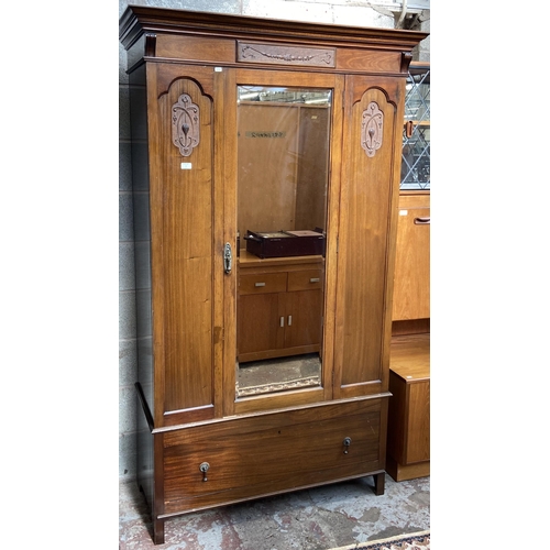 4 - An Edwardian carved mahogany mirror door wardrobe - approx. 205cm high x 119cm wide x 53cm deep