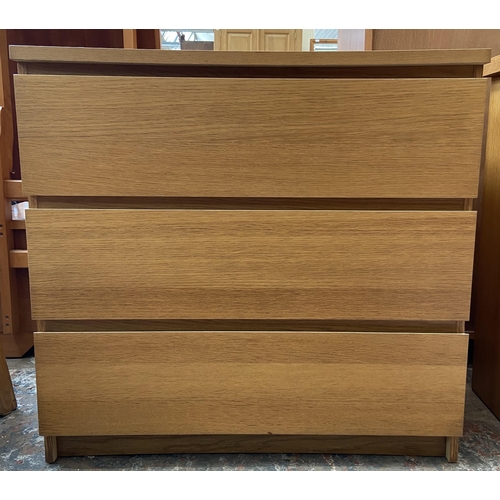 43 - An IKEA Malm oak effect chest of drawers - approx. 77cm high x 80cm wide x 48cm deep