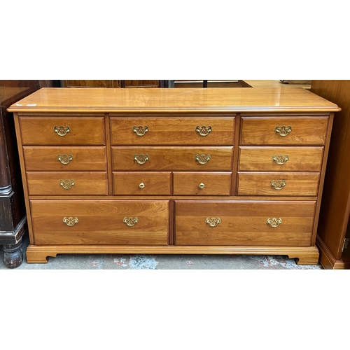 57 - A Younger cherry wood chest of drawers - approx. 81cm high x 143cm wide x 46cm deep