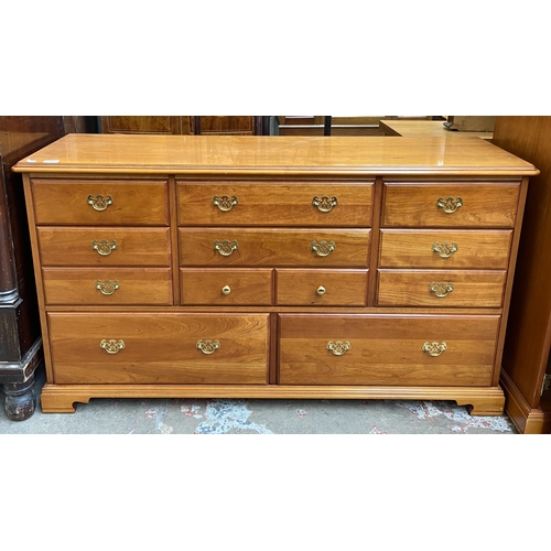 57 - A Younger cherry wood chest of drawers - approx. 81cm high x 143cm wide x 46cm deep