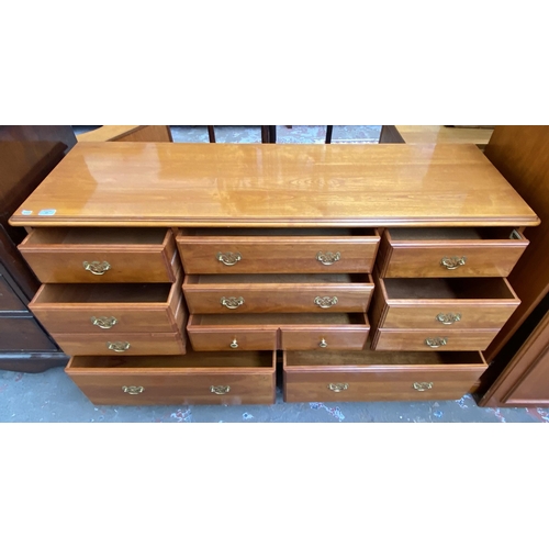 57 - A Younger cherry wood chest of drawers - approx. 81cm high x 143cm wide x 46cm deep