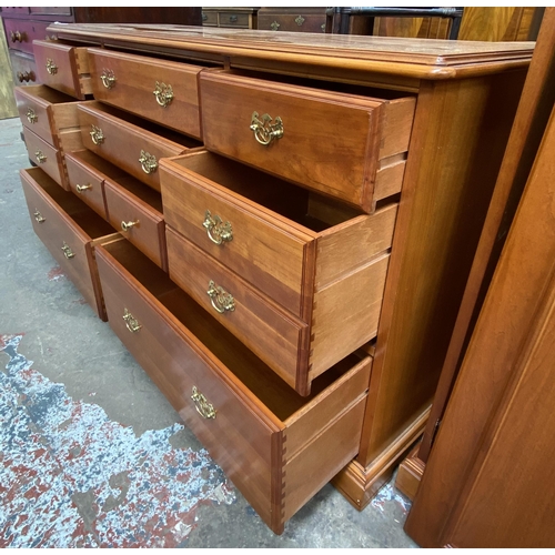 57 - A Younger cherry wood chest of drawers - approx. 81cm high x 143cm wide x 46cm deep