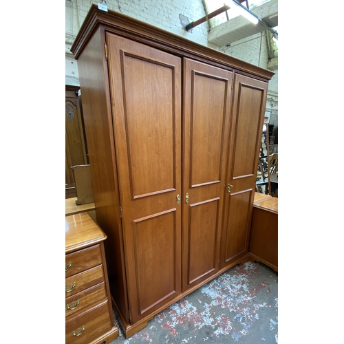 58 - A Younger cherry wood triple wardrobe - approx. 190cm high x 150cm wide x 60cm deep