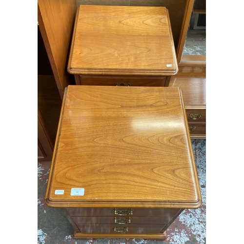 59 - A pair of Younger cherry wood bedside chests of drawers - approx. 68cm high x 47cm wide x 46cm deep