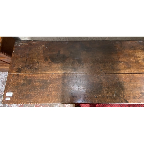 9 - A George III oak three drawer dresser base on cabriole supports - approx. 80cm high x 190cm wide x 4... 