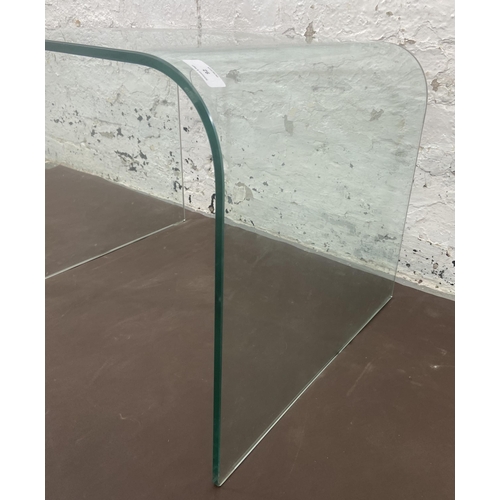 92 - A modern glass side table - approx. 45cm high x 56cm wide x 50cm deep