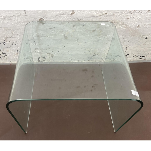 92 - A modern glass side table - approx. 45cm high x 56cm wide x 50cm deep