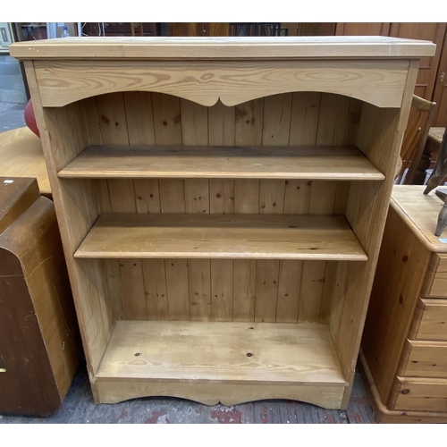 96 - A Victorian style pine three tier bookcase - approx. 125cm high x 95cm wide x 30cm deep