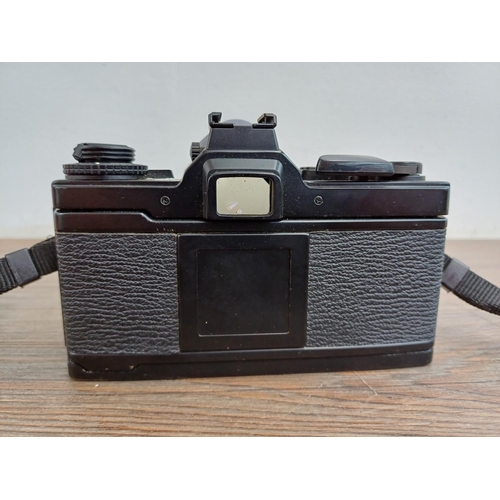 547 - An Olympus OM-4 35mm SLR camera body