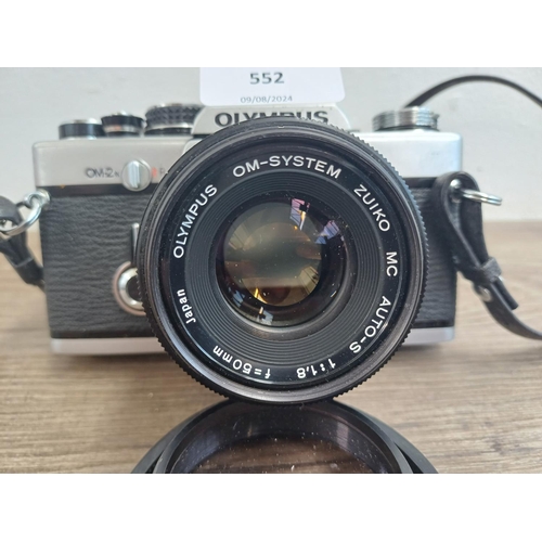 552 - An Olympus OM-2N 35mm SLR camera fitted with Zuiko MC 1:1.8 f=50mm auto-s lens