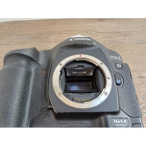 556 - A Canon EOS-1D Mark II 8mp professional DSLR camera body