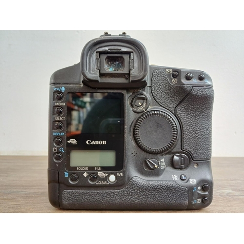 556 - A Canon EOS-1D Mark II 8mp professional DSLR camera body