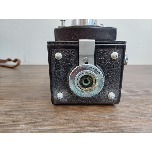 561 - A cased Yashica-A 6x6 TLR camera for 120 film fitted with Yashikor 1:3.5 f=80mm lenses and Copal shu... 