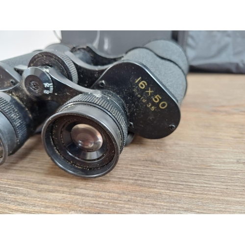 570 - Two cased pairs of binoculars, one Traveler 10-30x60 zoom and one Minox D & N 16x50