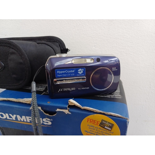 571 - Two boxed compact digital cameras, one Olympus µ[mju:] Digital 800 all-weather 8mp with software dis... 