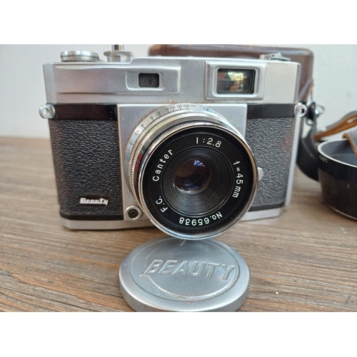 572 - Two Japanese 35mm rangefinder cameras, one late 1950s Beauty Super II and one mid 1960s Konica S III