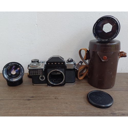 575 - A Canon Canonflex R2000 35mm SLR camera body with clip-on articulated selenium meter and two Super-C... 